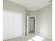 Bright bedroom with double doors leading to another room at 1722 Farmstead Ln, Oviedo, FL 32765