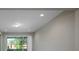 Open living area with sliding doors leading to a patio at 1722 Farmstead Ln, Oviedo, FL 32765