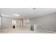 Spacious loft area with plush carpeting and a bathroom at 1722 Farmstead Ln, Oviedo, FL 32765