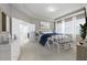 Main bedroom with plush carpet and en-suite bathroom at 1722 Farmstead Ln, Oviedo, FL 32765