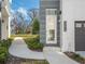 Front entrance with modern door and walkway at 1778 Mondrian Cir, Winter Park, FL 32789