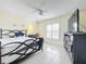 Bedroom with a ceiling fan and TV at 1876 Lake Francis Dr, Apopka, FL 32712