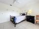 Bedroom with a ceiling fan and dresser at 1876 Lake Francis Dr, Apopka, FL 32712