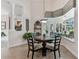 Breakfast nook with round table and view to the pool at 201 Hazeltine Dr, Debary, FL 32713