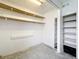 Additional storage space with built-in shelving units and a light above at 201 N East St, Leesburg, FL 34748