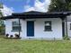 Newly renovated home with a carport and landscaped lawn at 2340 Hamilton St, Bartow, FL 33830