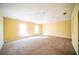 Bright bedroom featuring two windows and neutral wall tones at 266 Vervain Ave, Davenport, FL 33837