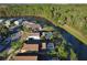 Aerial view showcasing home's waterfront location and neighborhood at 2981 Viscount Cir, Kissimmee, FL 34747