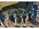 A high angle view of the backs of several houses, some featuring screened-in pools and lakeside settings at 2981 Viscount Cir, Kissimmee, FL 34747