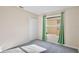 Bright bedroom with gray carpeting, a window, and a closet at 2981 Viscount Cir, Kissimmee, FL 34747