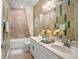 Bathroom with double vanity and bathtub at 31921 Redtail Reserve Blvd, Sorrento, FL 32776