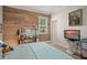 Cozy bedroom with wood-paneled wall, creating a calming atmosphere at 31921 Redtail Reserve Blvd, Sorrento, FL 32776