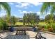 Relaxing patio with seating area, overlooking a scenic golf course at 31921 Redtail Reserve Blvd, Sorrento, FL 32776