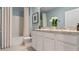 Bathroom with tub, toilet, and double vanity at 3428 Costello Cir, Winter Haven, FL 33884