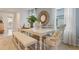 Dining room featuring a white table with bench seating at 3428 Costello Cir, Winter Haven, FL 33884