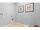 Laundry room with tile flooring, built-in shelving, and a clean design at 3428 Costello Cir, Winter Haven, FL 33884