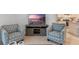 Living room showcasing comfortable seating and a view into the kitchen at 3428 Costello Cir, Winter Haven, FL 33884