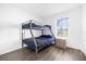 Bedroom with a bunk bed and ample floor space at 3900 Southpointe Dr # 127, Orlando, FL 32822