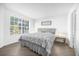 King-size bed in a spacious Primary bedroom at 3900 Southpointe Dr # 127, Orlando, FL 32822