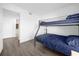 Bedroom with a bunk bed and access to a bathroom at 3900 Southpointe Dr # 127, Orlando, FL 32822