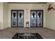 Ventura building entrance with decorated doors at 3900 Southpointe Dr # 127, Orlando, FL 32822