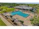 Resort-style pool with surrounding lounge chairs at 3900 Southpointe Dr # 127, Orlando, FL 32822