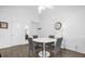 Bright dining area with a round table and four gray chairs at 3900 Southpointe Dr # 127, Orlando, FL 32822