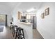 Condo kitchen featuring stainless steel appliances and light wood cabinets at 3900 Southpointe Dr # 127, Orlando, FL 32822