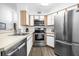 Well-equipped kitchen with stainless steel appliances at 3900 Southpointe Dr # 127, Orlando, FL 32822