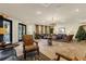 Spacious lobby with comfortable seating and chandelier at 3900 Southpointe Dr # 127, Orlando, FL 32822