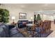 Elegant lobby with leather sofas and a Christmas tree at 3900 Southpointe Dr # 127, Orlando, FL 32822