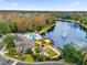 Aerial view of community pool, clubhouse, and lake at 412 Summit Ridge Pl # 210, Longwood, FL 32779