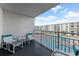 Balcony with patio furniture and pool view at 4153 S Atlantic Ave # 3070, New Smyrna Beach, FL 32169