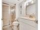 Bathroom with shower/tub combo and white vanity at 4153 S Atlantic Ave # 3070, New Smyrna Beach, FL 32169