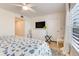 Spacious bedroom with king-size bed and dresser at 4153 S Atlantic Ave # 3070, New Smyrna Beach, FL 32169