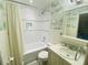 Bathroom with tub, shower and updated vanity at 4285 Sea Mist Dr, New Smyrna Beach, FL 32169