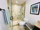 Bathroom with shower and tile finishes at 4285 Sea Mist Dr, New Smyrna Beach, FL 32169
