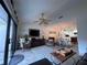 Open living room and kitchen with a view of the dining area at 4285 Sea Mist Dr, New Smyrna Beach, FL 32169