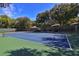 Newly resurfaced tennis court with green and blue surface at 4285 Sea Mist Dr, New Smyrna Beach, FL 32169
