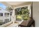 Private balcony with seating and wooded area view at 4320 S Kirkman Rd # 1502, Orlando, FL 32811