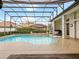 Enclosed pool area with spa and basketball game at 4520 Old Carriage Trl, Oviedo, FL 32765