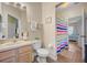 Bathroom with shower/tub combo and vanity at 4849 Cypress Woods Dr # 1310, Orlando, FL 32811