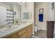 Bathroom with double sinks and a separate shower at 4849 Cypress Woods Dr # 1310, Orlando, FL 32811