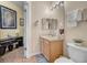 Clean bathroom with single sink vanity and toilet at 4849 Cypress Woods Dr # 1310, Orlando, FL 32811