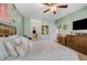 Main bedroom with king-size bed and en-suite bathroom at 4849 Cypress Woods Dr # 1310, Orlando, FL 32811