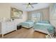 Bright bedroom with two twin beds and ample closet space at 4849 Cypress Woods Dr # 1310, Orlando, FL 32811