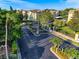 Gated community entrance with ample parking and landscaping at 4849 Cypress Woods Dr # 1310, Orlando, FL 32811