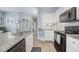 Modern kitchen with granite countertops and stainless steel appliances at 4849 Cypress Woods Dr # 1310, Orlando, FL 32811