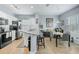 Modern kitchen featuring island, stainless steel appliances, and breakfast nook at 4849 Cypress Woods Dr # 1310, Orlando, FL 32811