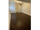 Bright bonus room features dark wood-look laminate flooring and a spacious layout at 513 Harvard Pl, Apopka, FL 32703